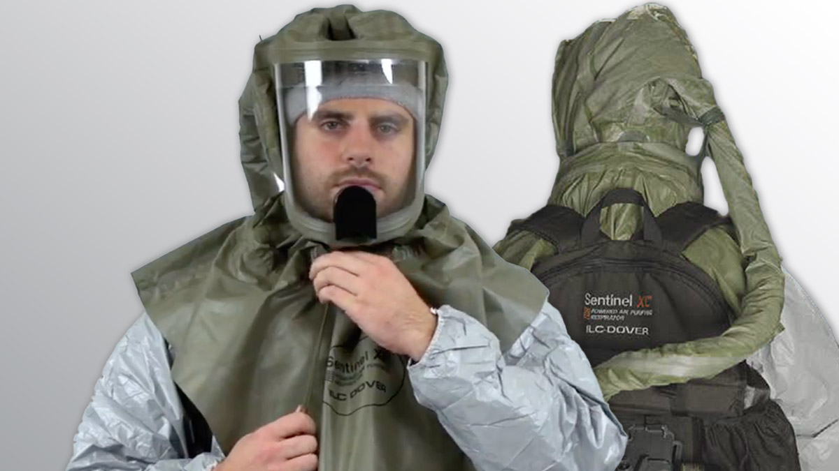 Front and back view of a man wearing ILC Dover's Sentinel XL® CBRN powered air purifying respirator (PAPR) head cover