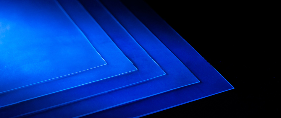 Close-up of five ArmorFlex® Films lined up on a blue background