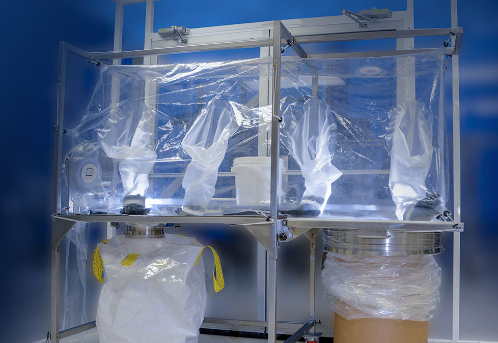 Flexible containment isolator, also known as a glove bag, attached to a single-use container and drum transfer system
